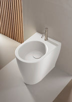 Sanitari filomuro senza brida scarico traslato Domus Falerii collezione Multipla 52x36 cm bianco lucido