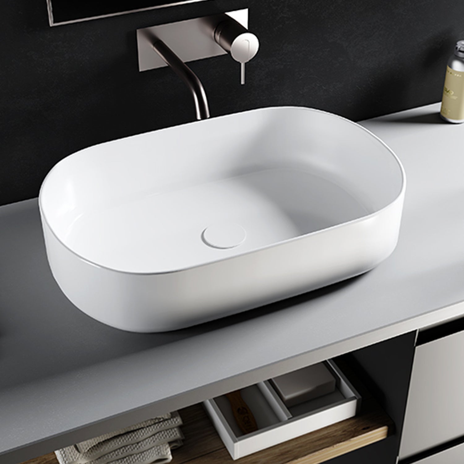 Lavabo da appoggio ovale in ceramica bianco lucido BathCore serie Infinity cm 55x36