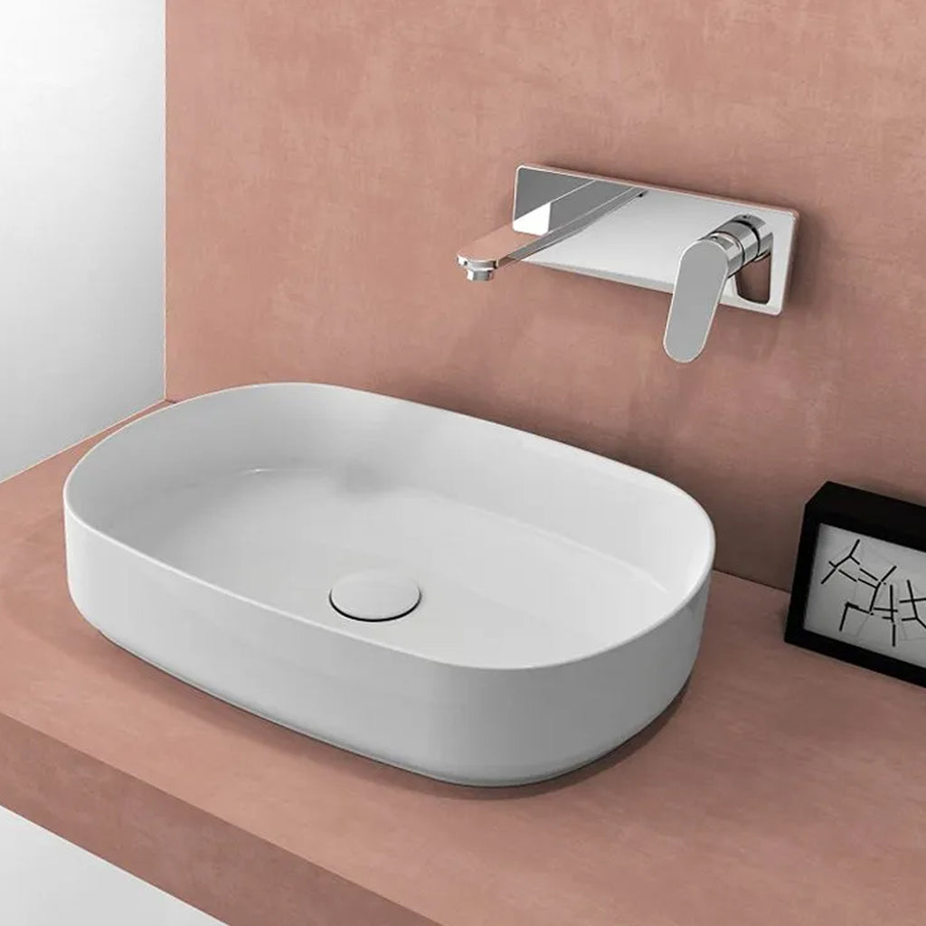 Lavabo da appoggio ovale in ceramica bianco lucido BathCore serie Infinity cm 55x36