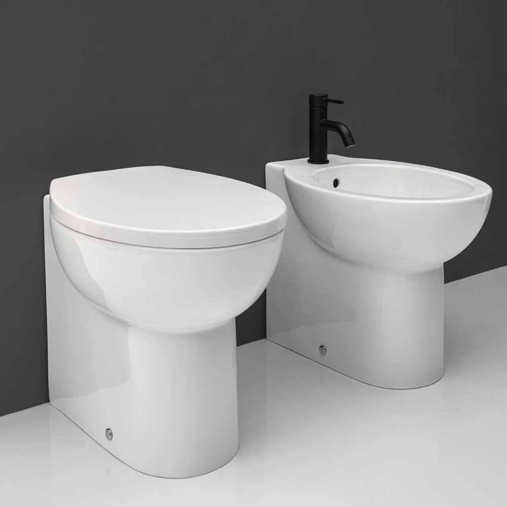 Sanitari a terra filo parete Axa collezione Prima wc + bidet + sedile soft close
