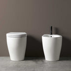 Sanitari a terra filo parete Axa collezione Avani wc + bidet + sedile soft close