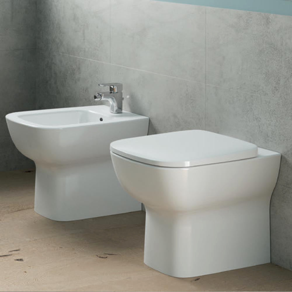 Sanitari filo muro scarico traslato Ideal Standard Esedra Wc + bidet + sedile chiusura rallentata