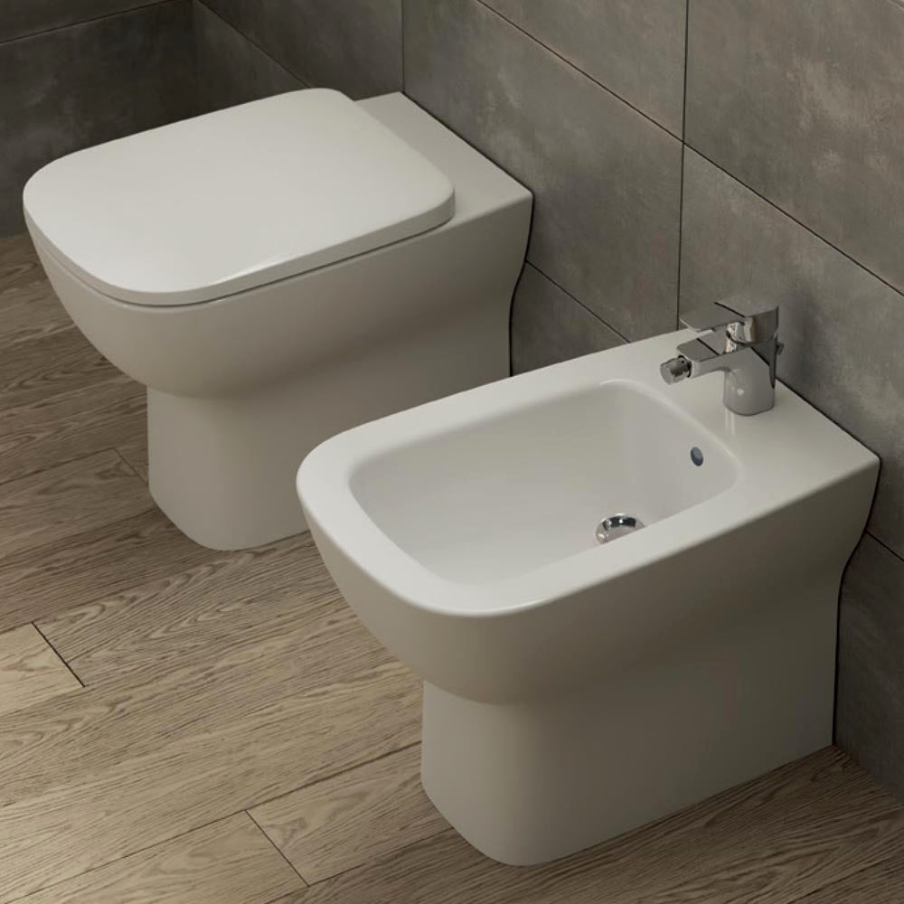 Sanitari filo muro scarico traslato Ideal Standard Esedra Wc + bidet + sedile chiusura rallentata