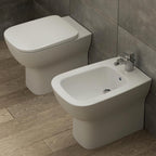 Sanitari filo muro scarico traslato Ideal Standard Esedra Wc + bidet + sedile chiusura rallentata
