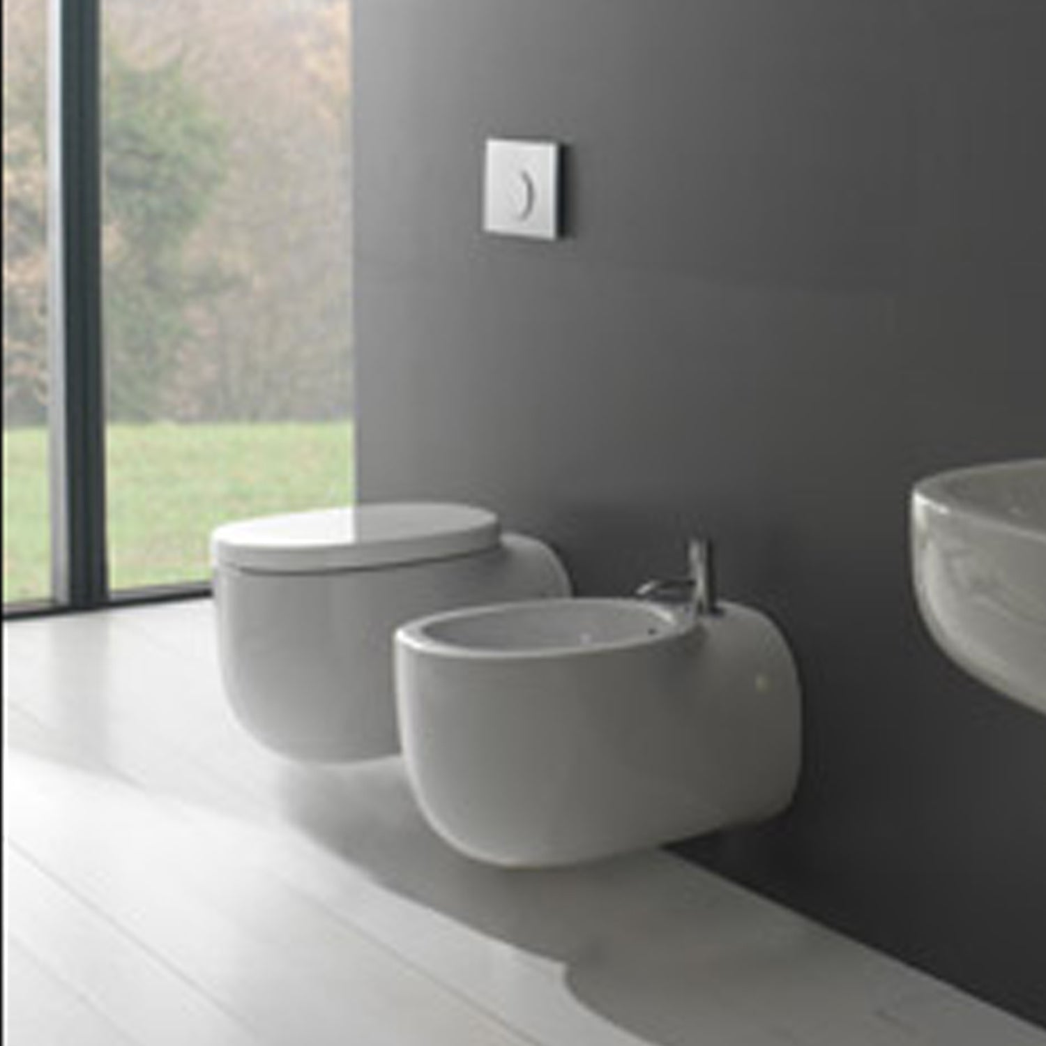Coppia di sanitari sospesi Globo modello Olivia 55x37 cm con copriwater a chiusura rallentata