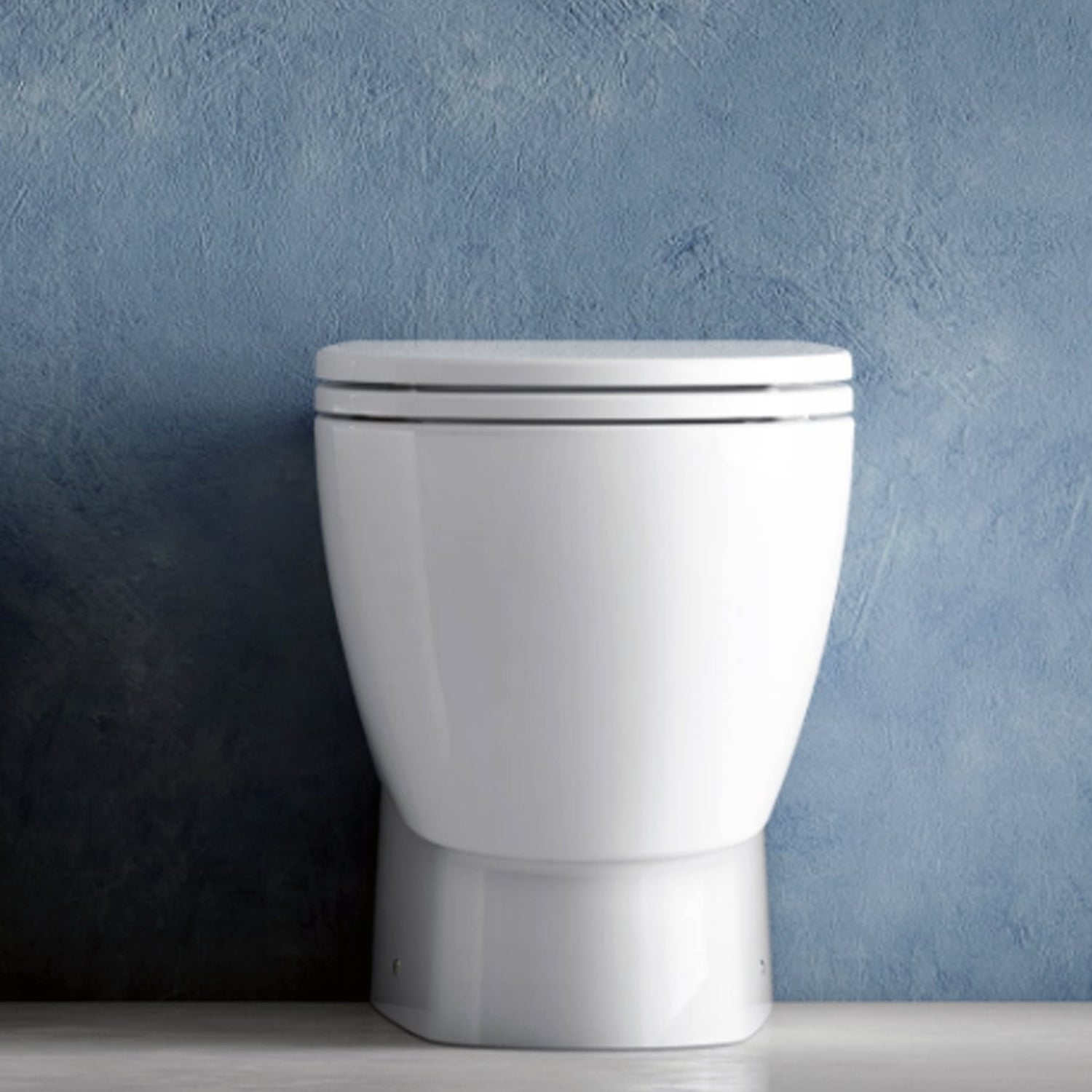 Wc filomuro Ceramica Dolomite modello Demy 54x36 cm con sedile Softclose