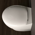 Sedile per wc mascalzone con chiusura rallentata in termoindurente