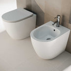 Vaso filomuro senza brida 52x37 cm con Copriwater Soft Close BathCore serie Aria - Bianco Lucido