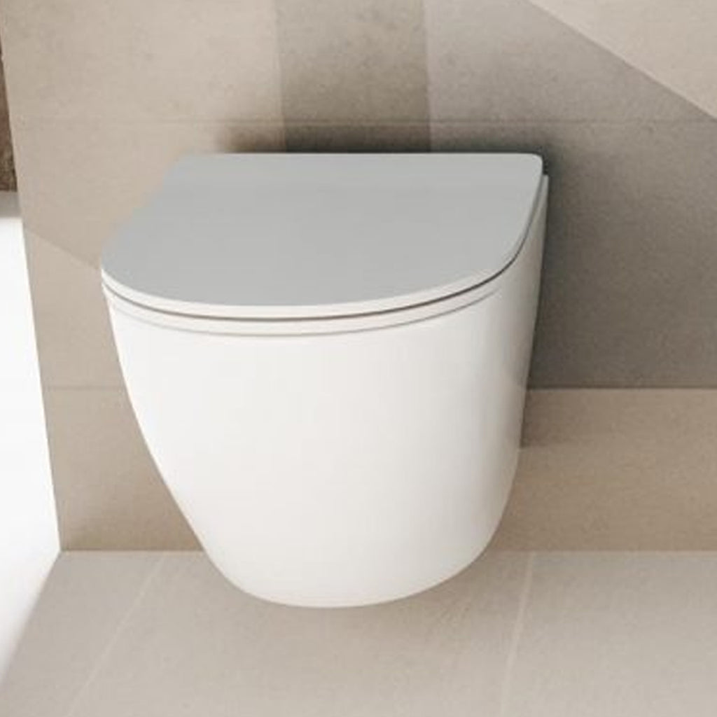 Vaso sospeso senza brida 52x37 con Copriwater Soft Close BathCore serie Aria - Bianco Lucido
