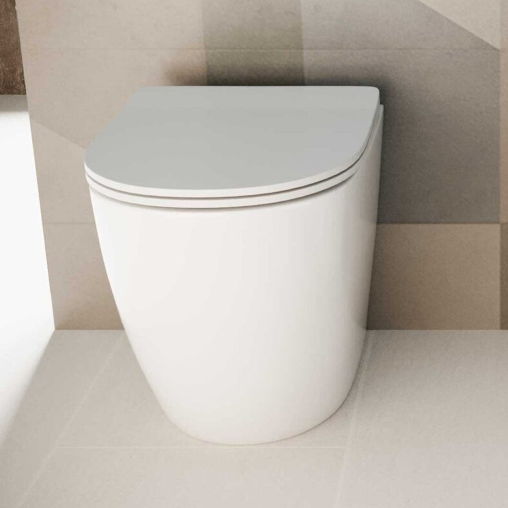 Vaso filomuro BathCore serie Aria Special H50 56x37 - Bianco Lucido